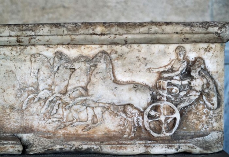 马车比赛是热门的奥运项目，而且非常危险，经常有人在比赛中死亡。 PHOTOGRAPH BY DEAGOSTINI， GETTY IMAGES