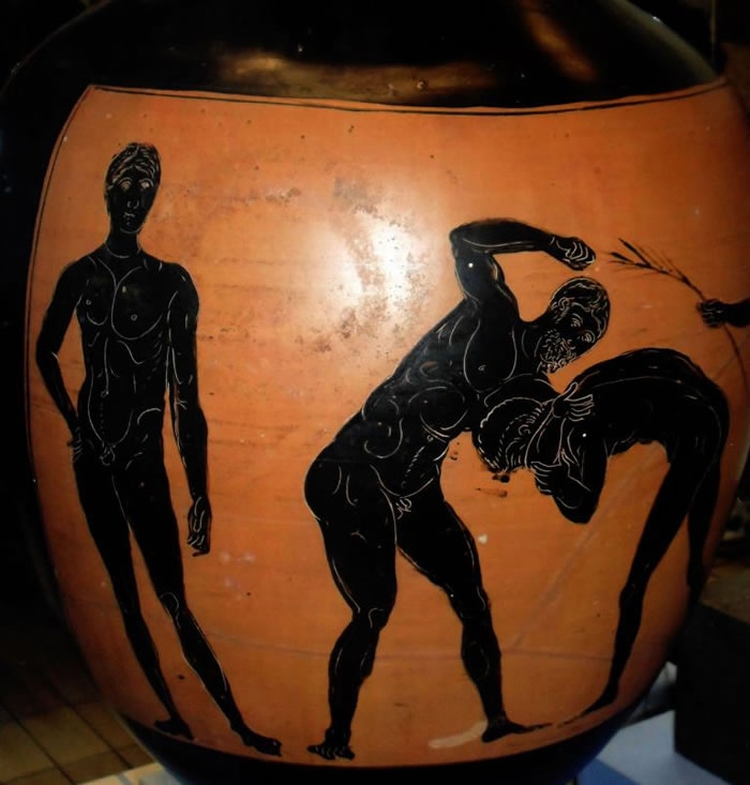 两位pankration选手；这是结合拳击与摔角的自由搏斗，只差不能咬人或刺人。 PHOTOGRAPH BY WORLD HISTORY ARCHIVE， AL